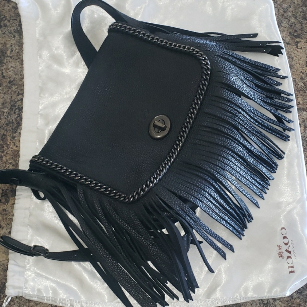 Large coach dakotah crossbody full fringe.